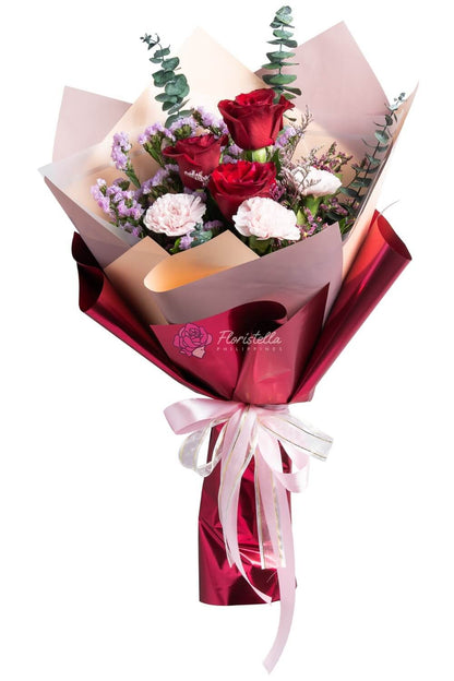 Red roses, pink statice and carnations anniversary bouquet — Garnet | Floristella